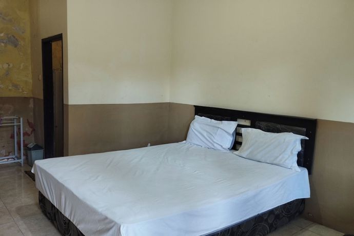 Imagen de la habitación del Hotel OYO 92756 Kos Moncok. Foto 8