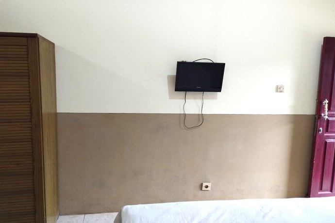 Imagen de la habitación del Hotel OYO 92756 Kos Moncok. Foto 10