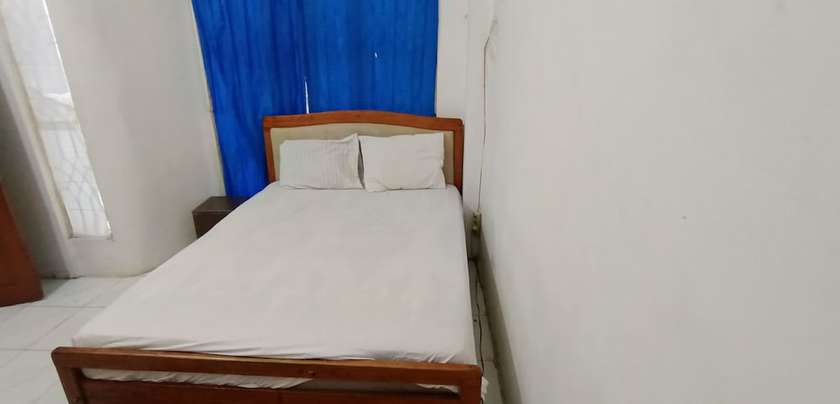 Imagen de la habitación del Hotel OYO 92762 Wisma Pundu Syariah. Foto 6