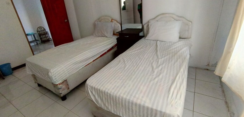 Imagen de la habitación del Hotel OYO 92762 Wisma Pundu Syariah. Foto 8