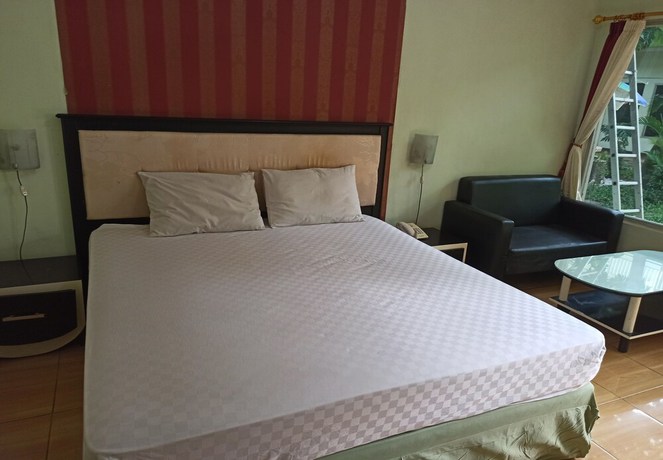 Imagen de la habitación del Hotel OYO 92762 Wisma Pundu Syariah. Foto 9