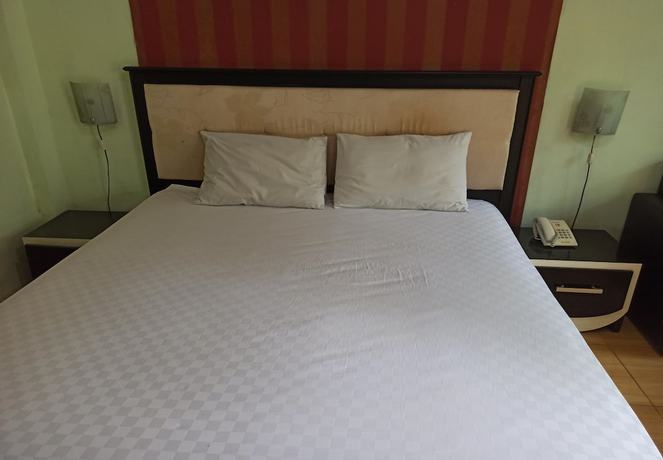 Imagen de la habitación del Hotel OYO 92762 Wisma Pundu Syariah. Foto 10
