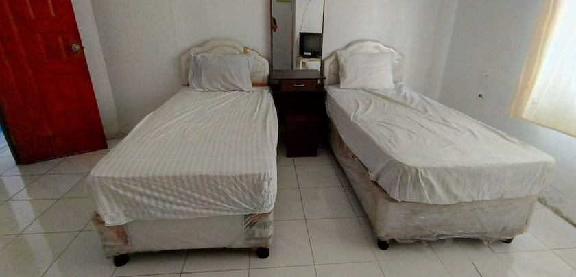 Imagen de la habitación del Hotel OYO 92762 Wisma Pundu Syariah. Foto 12
