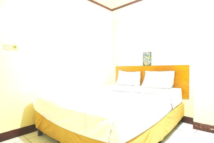 Imagen de la habitación del Hotel OYO 92778 Rumah Massagena Syariah. Foto 5