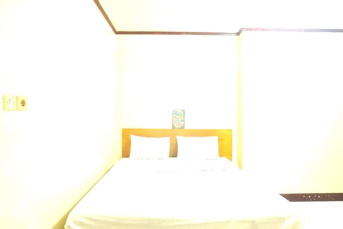 Imagen de la habitación del Hotel OYO 92778 Rumah Massagena Syariah. Foto 7