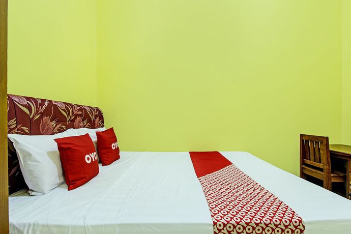 Imagen de la habitación del Hotel OYO 92792 Umi Rahayu Guesthouse. Foto 2
