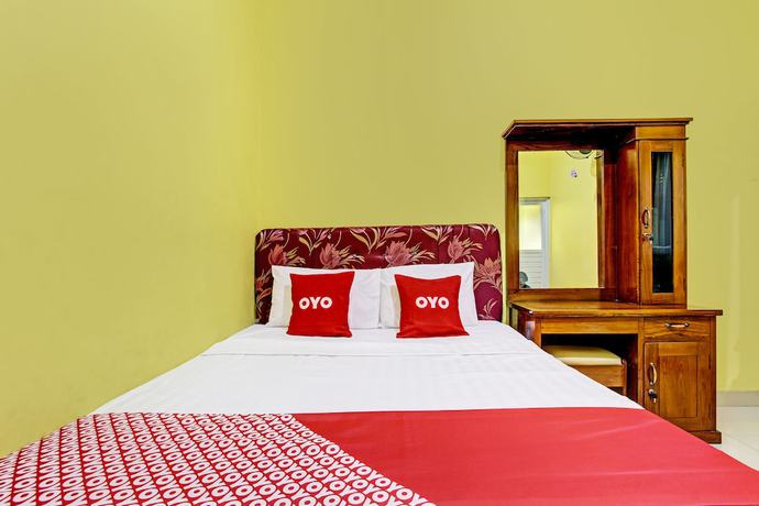 Imagen de la habitación del Hotel OYO 92792 Umi Rahayu Guesthouse. Foto 3