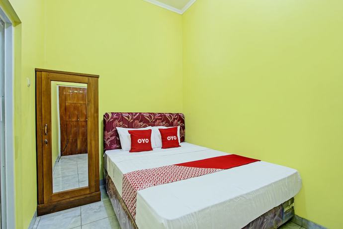 Imagen de la habitación del Hotel OYO 92792 Umi Rahayu Guesthouse. Foto 4