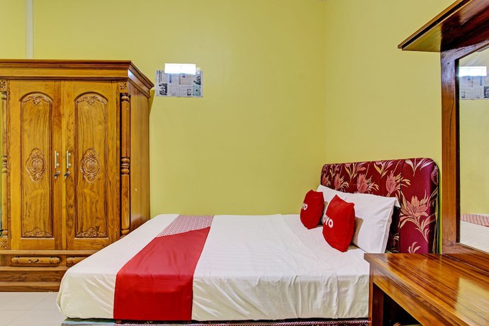 Imagen de la habitación del Hotel OYO 92792 Umi Rahayu Guesthouse. Foto 5