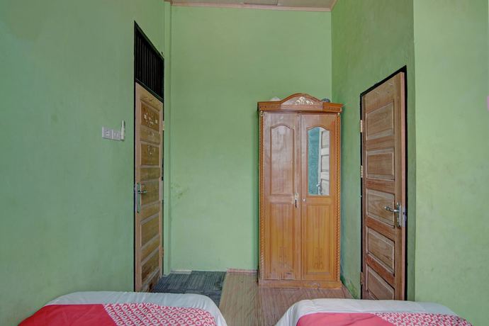Imagen de la habitación del Hotel OYO 92818 Penginapan Garuda Syariah. Foto 5