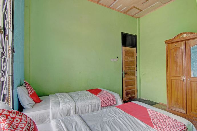 Imagen de la habitación del Hotel OYO 92818 Penginapan Garuda Syariah. Foto 8