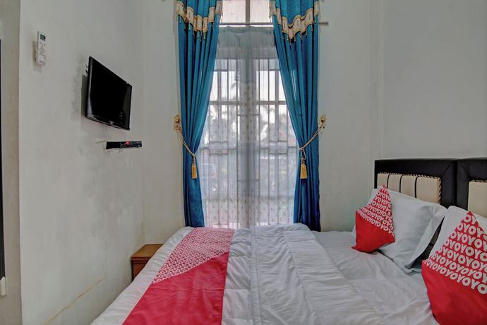Imagen de la habitación del Hotel OYO 92818 Penginapan Garuda Syariah. Foto 13