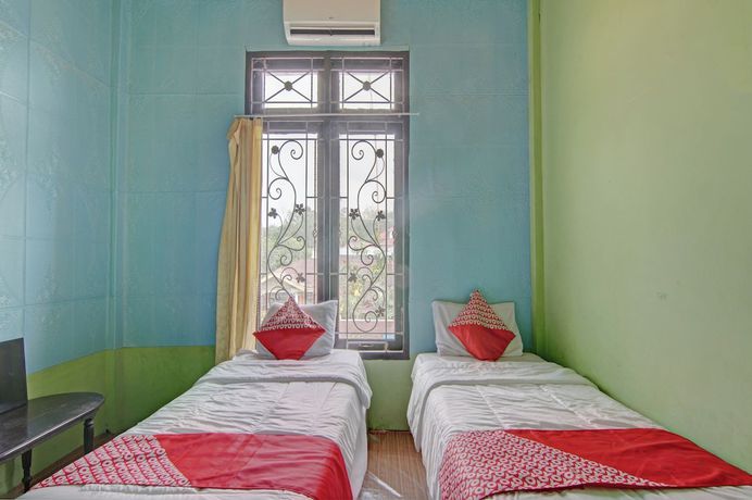 Imagen de la habitación del Hotel OYO 92818 Penginapan Garuda Syariah. Foto 15