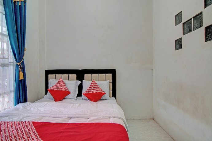 Imagen de la habitación del Hotel OYO 92818 Penginapan Garuda Syariah. Foto 16