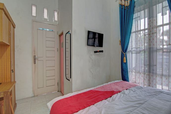 Imagen de la habitación del Hotel OYO 92818 Penginapan Garuda Syariah. Foto 18