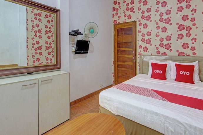 Imagen de la habitación del Hotel OYO 92821 Wisma Zahira 2 Syariah. Foto 3