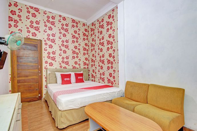 Imagen de la habitación del Hotel OYO 92821 Wisma Zahira 2 Syariah. Foto 6
