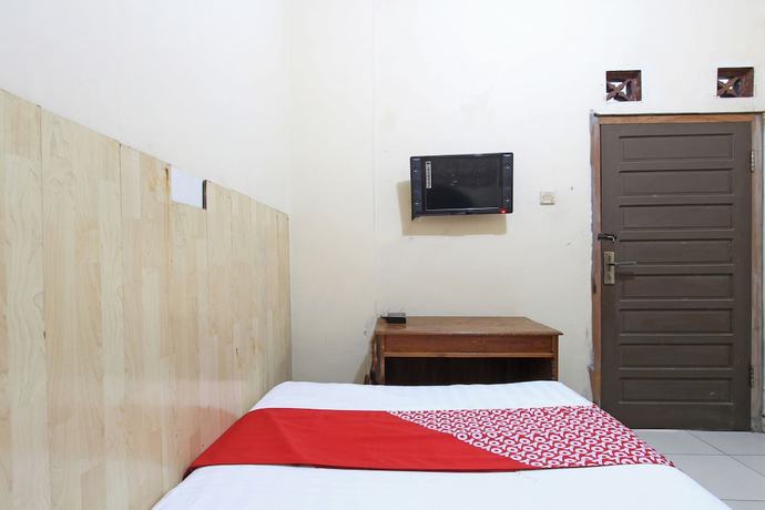 Imagen de la habitación del Hotel OYO 92821 Wisma Zahira 2 Syariah. Foto 7