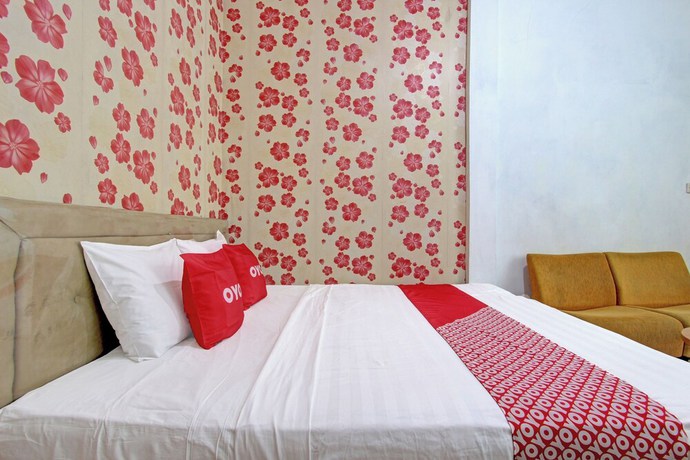 Imagen de la habitación del Hotel OYO 92821 Wisma Zahira 2 Syariah. Foto 9