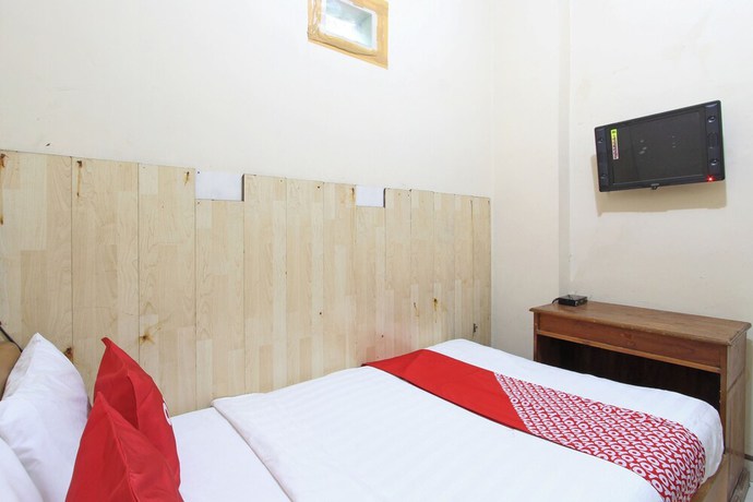 Imagen de la habitación del Hotel OYO 92821 Wisma Zahira 2 Syariah. Foto 10