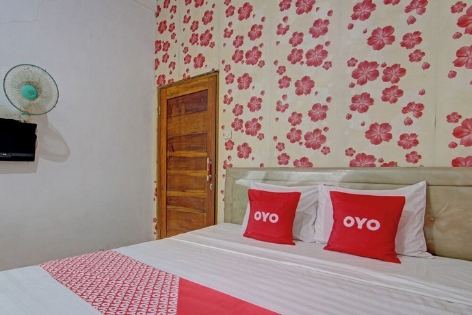 Imagen de la habitación del Hotel OYO 92821 Wisma Zahira 2 Syariah. Foto 11