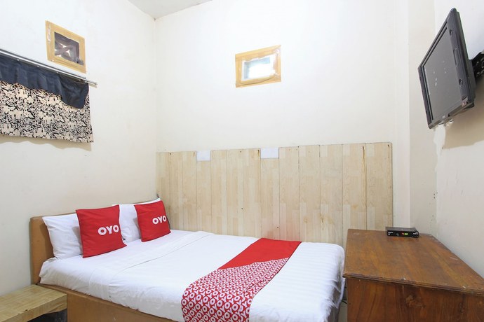 Imagen de la habitación del Hotel OYO 92821 Wisma Zahira 2 Syariah. Foto 12