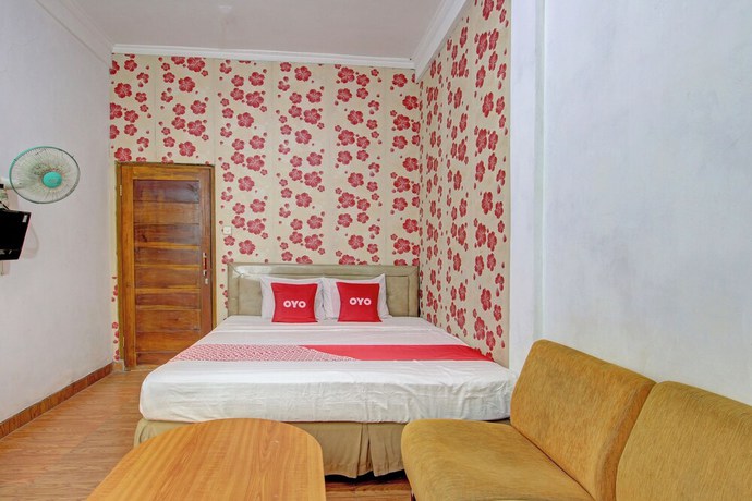 Imagen de la habitación del Hotel OYO 92821 Wisma Zahira 2 Syariah. Foto 13
