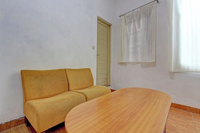 Imagen de la habitación del Hotel OYO 92821 Wisma Zahira 2 Syariah. Foto 14