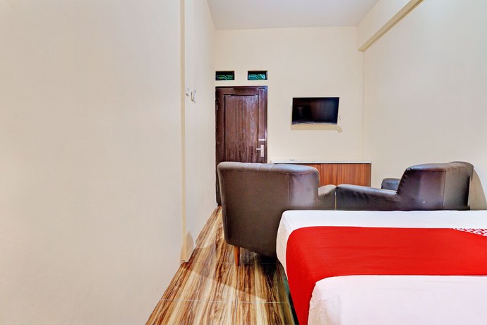 Imagen de la habitación del Hotel OYO 92871 Ciparay Residence. Foto 7