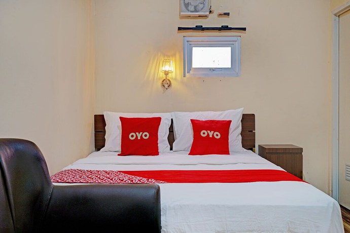 Imagen de la habitación del Hotel OYO 92871 Ciparay Residence. Foto 8