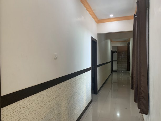 Imagen de los interiores del Hotel OYO 92899 Penginapan Laota Syariah. Foto 14