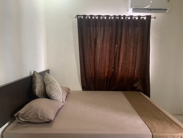 Imagen de la habitación del Hotel OYO 92899 Penginapan Laota Syariah. Foto 3