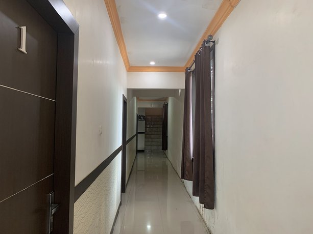 Imagen de los interiores del Hotel OYO 92899 Penginapan Laota Syariah. Foto 15