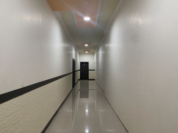 Imagen de los interiores del Hotel OYO 92899 Penginapan Laota Syariah. Foto 17
