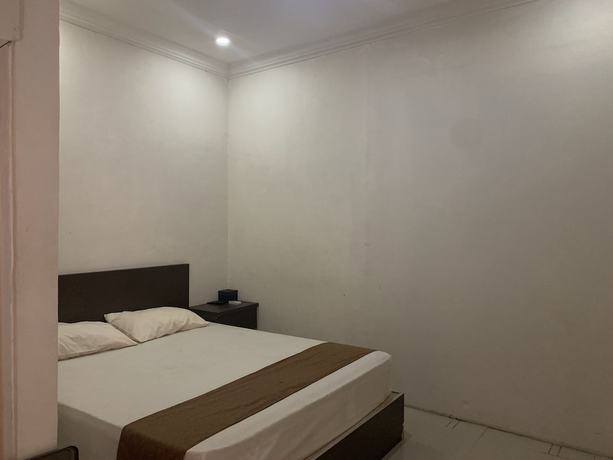 Imagen de la habitación del Hotel OYO 92899 Penginapan Laota Syariah. Foto 11