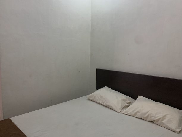 Imagen de la habitación del Hotel OYO 92899 Penginapan Laota Syariah. Foto 13