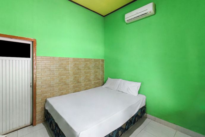 Imagen de la habitación del Hotel OYO 92908 Jayanni. Foto 7