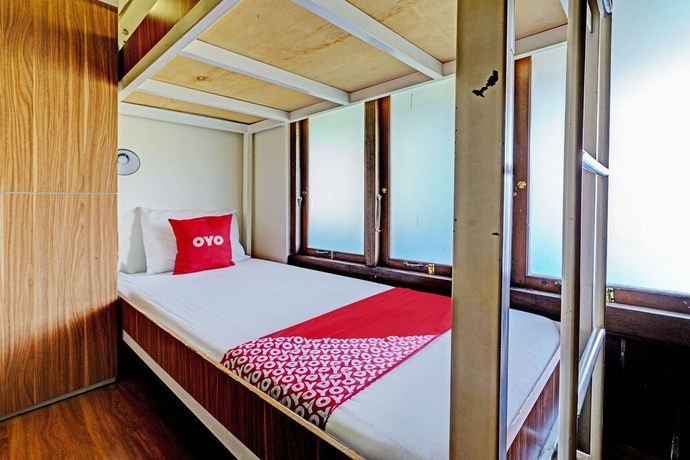 Imagen de la habitación del Hotel OYO 92927 Griya Ayu Minahasa. Foto 7