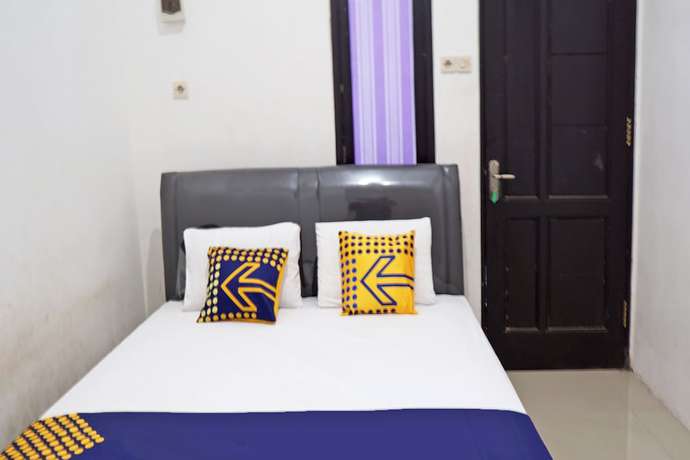Imagen de la habitación del Hotel OYO 92938 Kost Putih Syariah. Foto 2