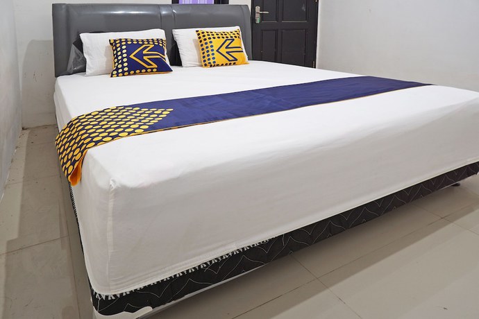 Imagen de la habitación del Hotel OYO 92938 Kost Putih Syariah. Foto 5