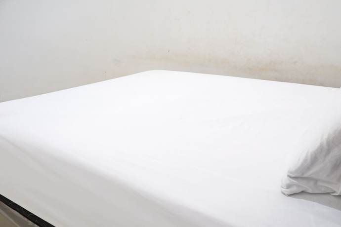 Imagen de la habitación del Hotel OYO 92938 Kost Putih Syariah. Foto 8