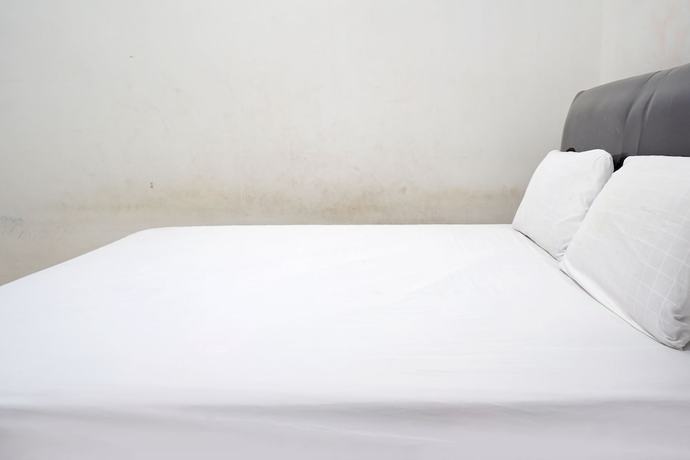 Imagen de la habitación del Hotel OYO 92938 Kost Putih Syariah. Foto 10