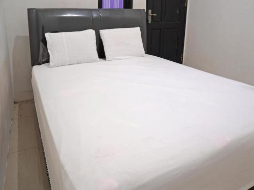 Imagen general del Hotel OYO 92938 Kost Putih Syariah. Foto 17