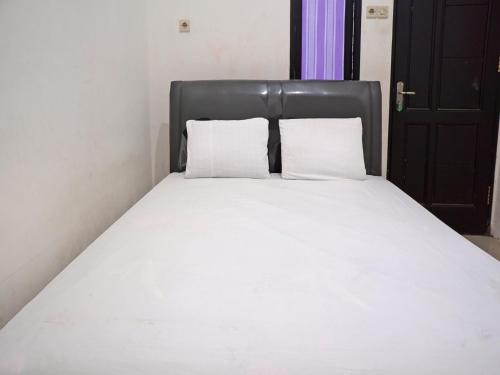 Imagen general del Hotel OYO 92938 Kost Putih Syariah. Foto 18
