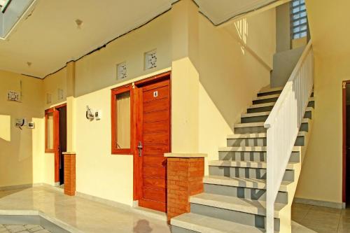 Imagen general del Hotel OYO 92952 Nirmala Guest House. Foto 1