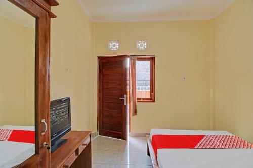 Imagen general del Hotel OYO 92952 Nirmala Guest House. Foto 18