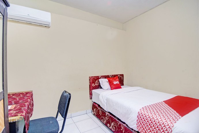 Imagen de la habitación del Hotel OYO 92964 Kost 99. Foto 10