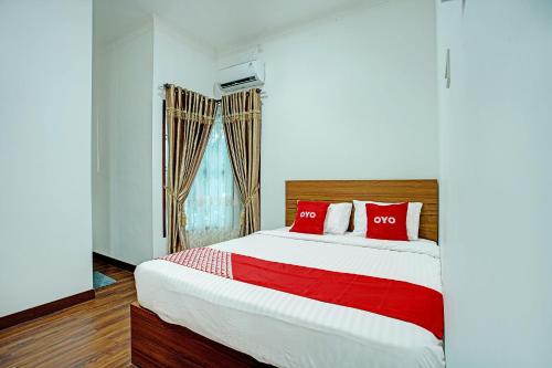 Imagen de la habitación del Hotel OYO 92990 Nena Kostel Syariah. Foto 20