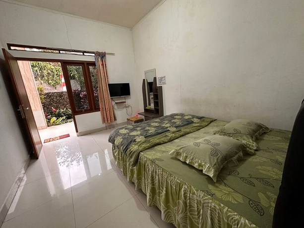 Imagen de la habitación del Hotel OYO 92995 Villa Ragill. Foto 7