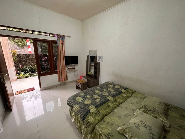 Imagen de la habitación del Hotel OYO 92995 Villa Ragill. Foto 12